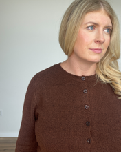 Load image into Gallery viewer, Woman wearing a brown cardigan against a plain background