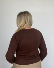 Load image into Gallery viewer, Person wearing a brown sweater against a plain background
