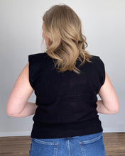 Load image into Gallery viewer, woman in a black mock neck tank with structured shoulders
