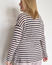 Load image into Gallery viewer, blonde woman wearing light knit sweater with navy diamond print and ivory background
