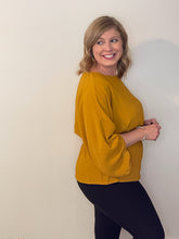 Load image into Gallery viewer, Woman in mustard color blouse with elastic waist
